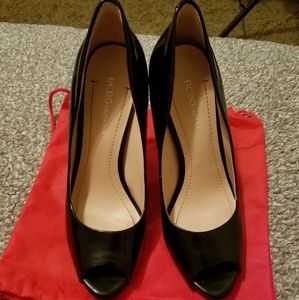 Black peep toe pumps